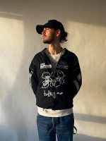 Revofits Vintage Racing Jacket paired with jeans and sneakers for a retro streetwear look