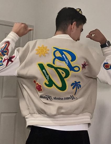 Back view of Revofits Varsity Jacket showcasing floral, star patches, and retro baseball styling.