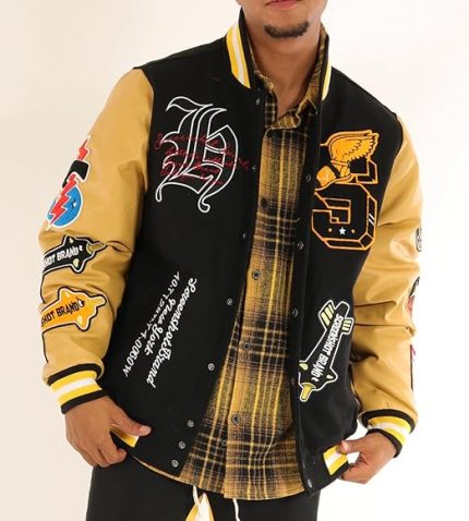Front view of VARSITY JACKET 3202 with black/gold embroidery, button closure, and urban streetwear design.*