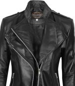 Close‑up of offset zipper and quilted shoulder detail on leather jacket