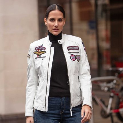 White leather jacket paired with a black dress for an elegant night look